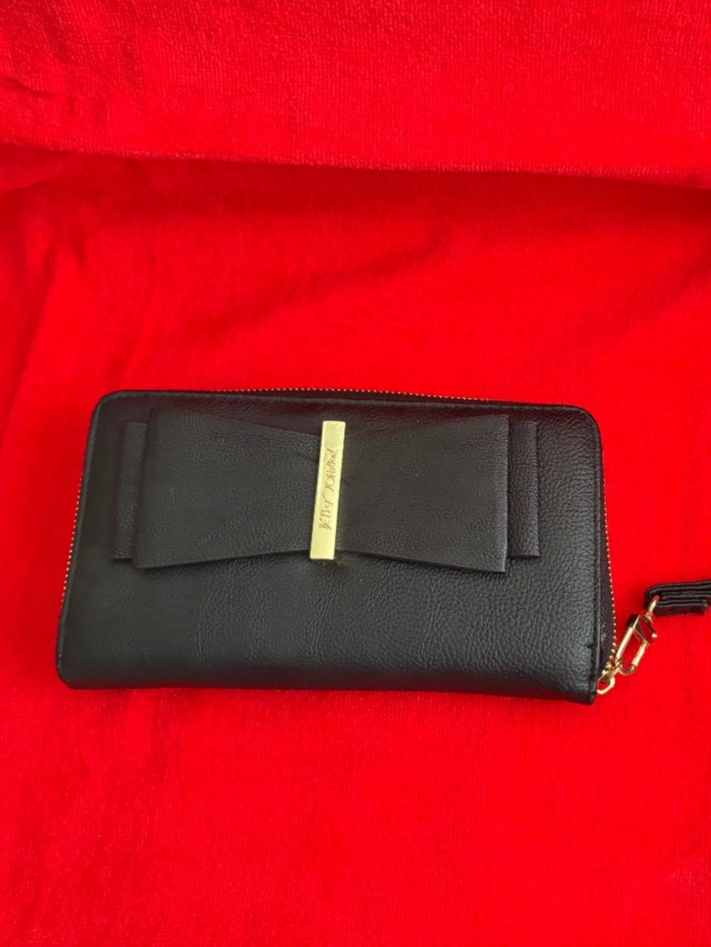 Betsy Johnson black leather wristlet